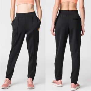 Nike Court DryFit knit tennis pants black size M